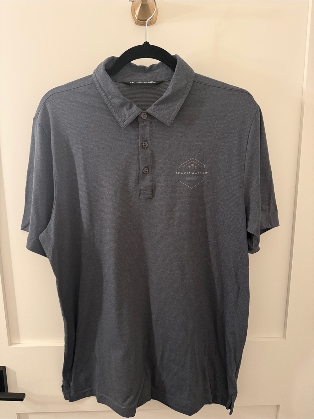 Travis Mathew Men's Polo Shirt in Charcoal Gray with Subtle Logo